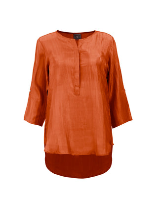Blusón de seda con manga 3/4 en colores tierra, tunica corta de Sedas Nai Nai, con textura suave y diseño elegante.
