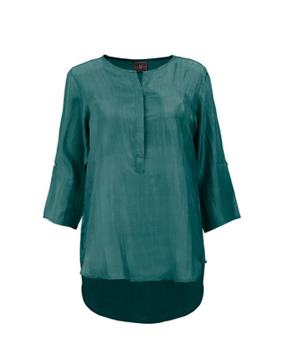 Blusón de seda con manga 3/4 en tonos tierra, de la marca Sedas Nai Nai, en color verde petróleo, con diseño de túnica corta.